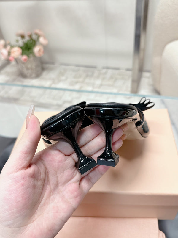 Miu Mordoré Black Bows Mules 50mm Black Cowhide 445521