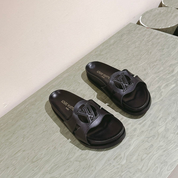 lv sandal isola flat mule black calfskin