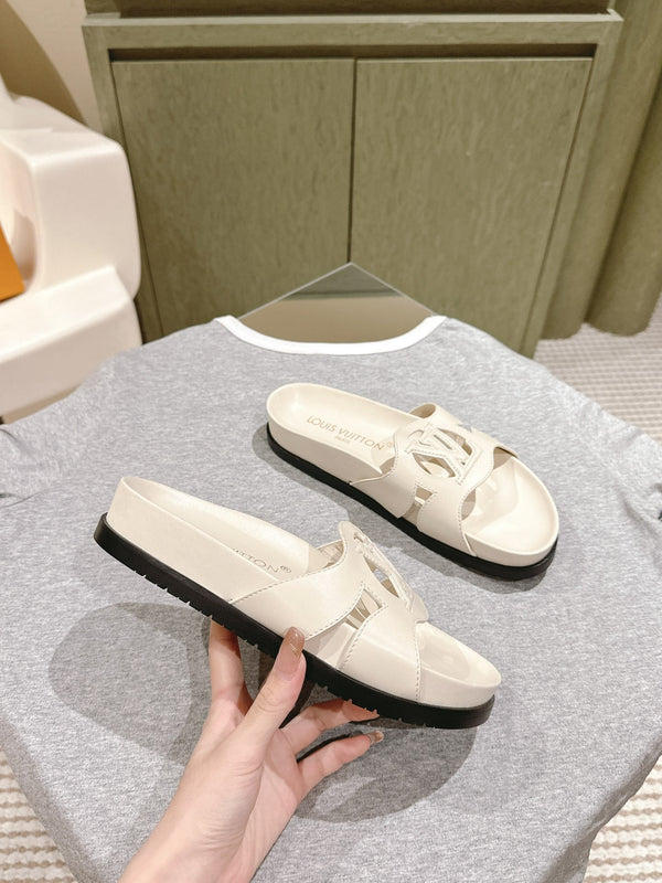 lv sandal isola flat mule cream calfskin