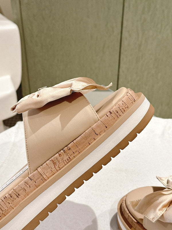 CC SLIPPERS WITH SILK BOW IN BEIGE ALMOND COWHIDE