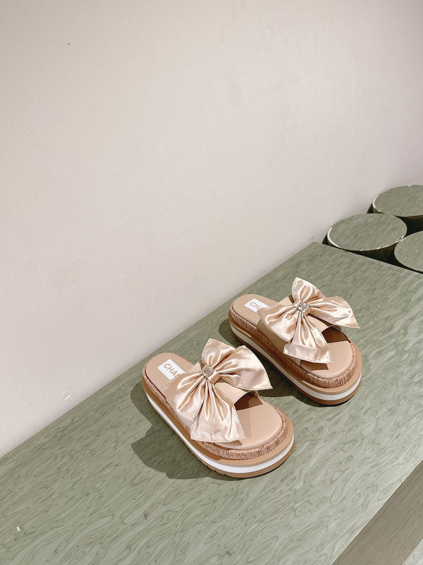 CC SLIPPERS WITH SILK BOW IN BEIGE ALMOND COWHIDE