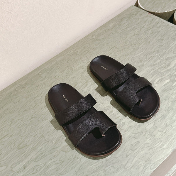 The Row Hugh Slides Black Cowhide Rubber 451281