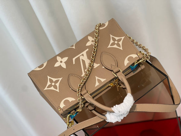 onthego 25 east west da bicolor monogram empreinte