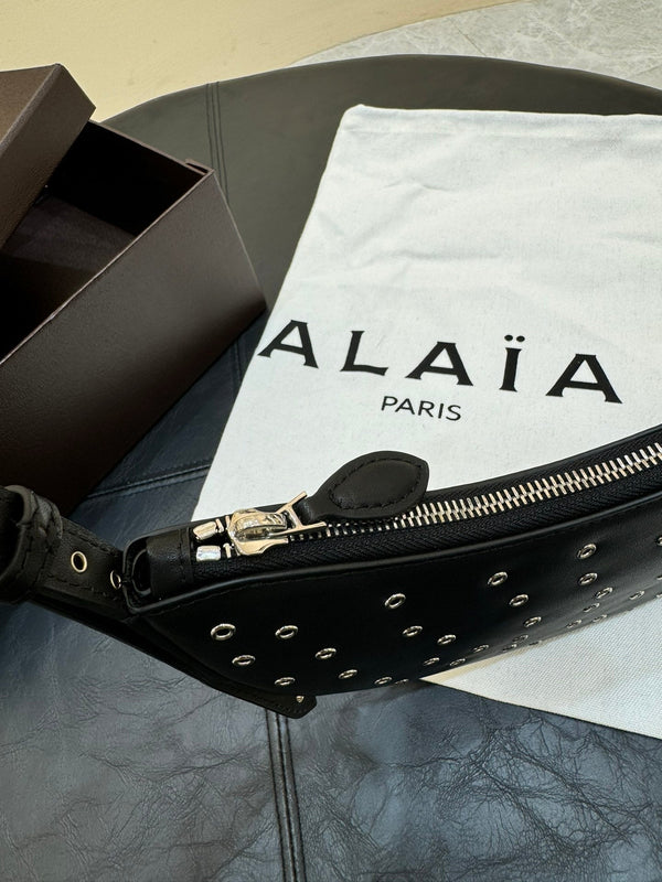 ONE PIECE DEMI LUNE BAG 31 IN BLACK SHEEPSKIN EYELET DETAILING