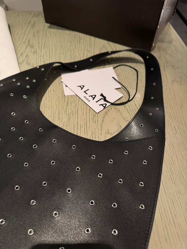 ONE PIECE MEDIUM BAG 39 IN BLACK SHEEPSKIN EYELET DETAILING