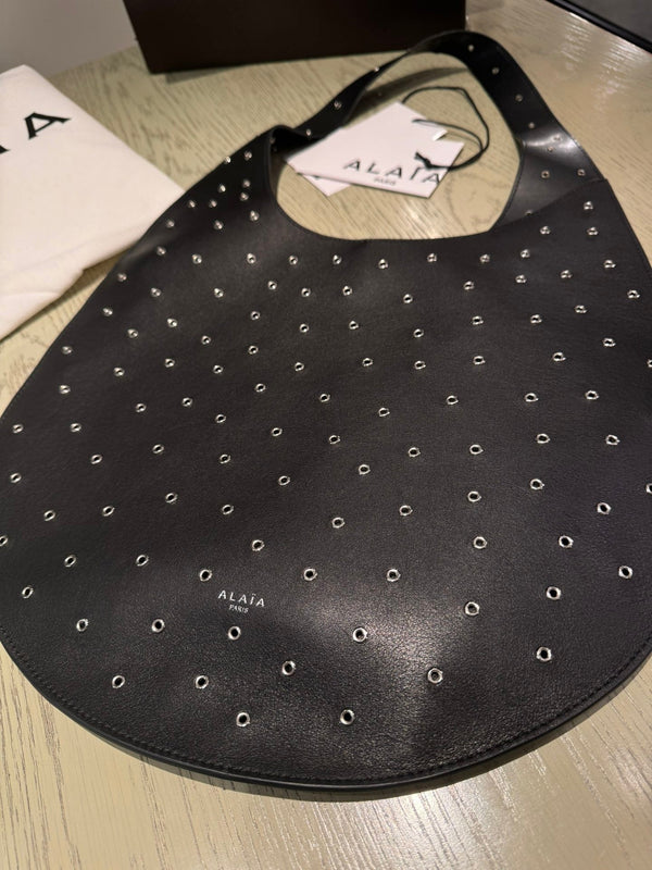 ONE PIECE MEDIUM BAG 39 IN BLACK SHEEPSKIN EYELET DETAILING