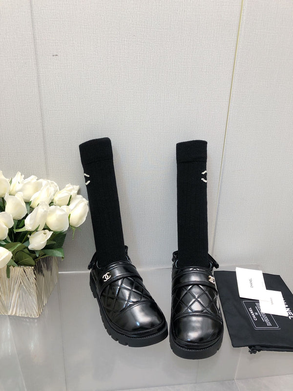 PANTOFOLA CON PLATEAU IN PELLE DI AGNELLO NERA