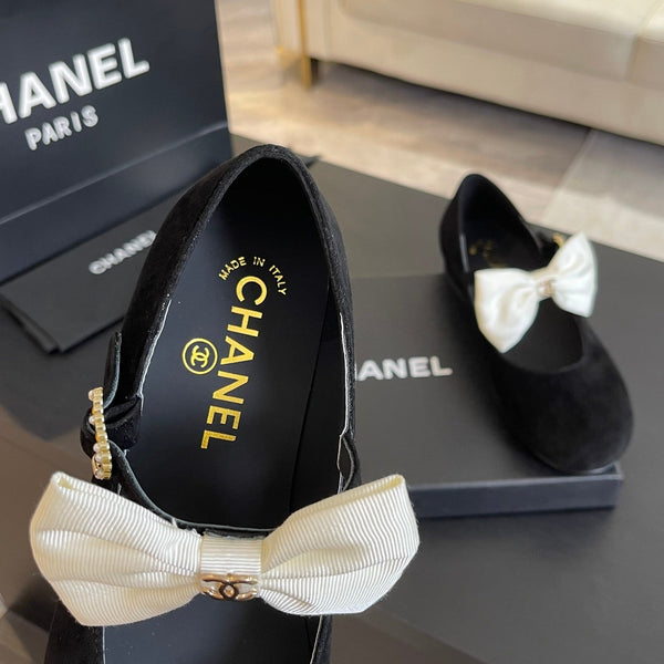 BALLERINA IN PELLE SCAMOSCIATA NERA CON FIOCCO BIANCO