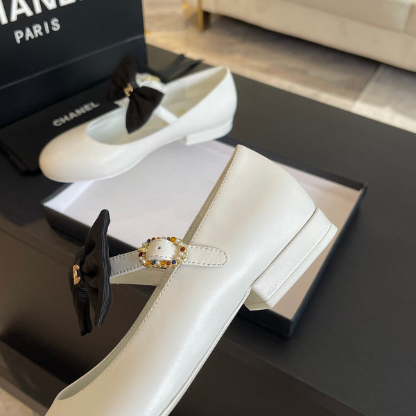 BALLET FLAT IN PELLE DI AGNELLO BIANCA CON FIOCCO NERO