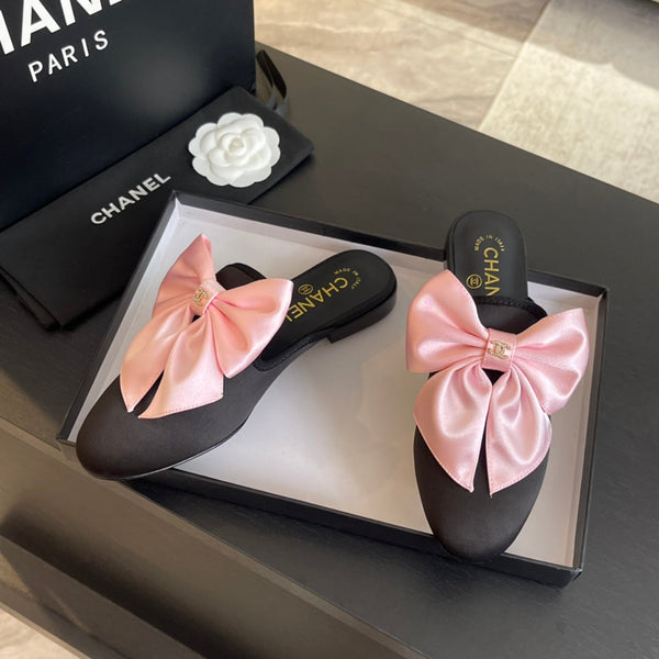 BIG BOW FLAT MULE SANDALS IN BLACK MIX PALE PINK SILK