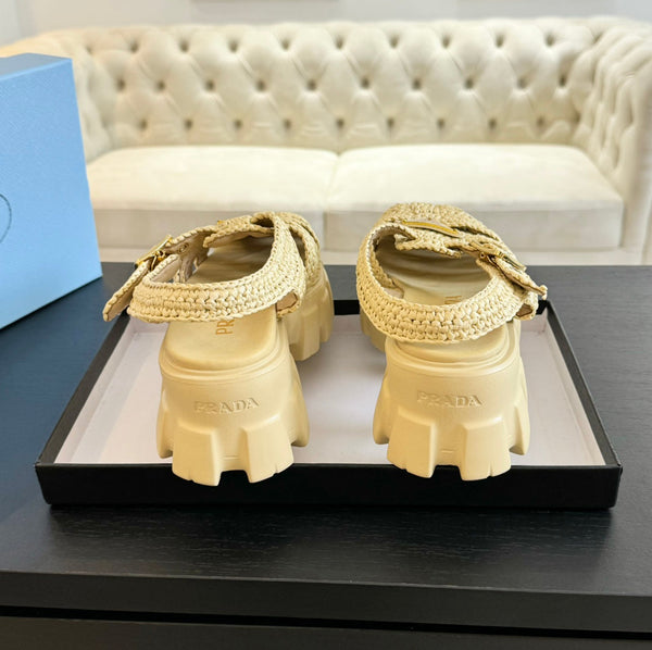 SANDALI A GABBIA IN PELLE DI AGNELLO GIALLO PASTELLO CON CROCHET MONOLITH PRA