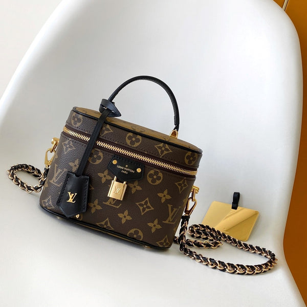 LV M47128 Vanity PM 13 cm con catena in tela monogramma marrone e pelle di caftano GHW