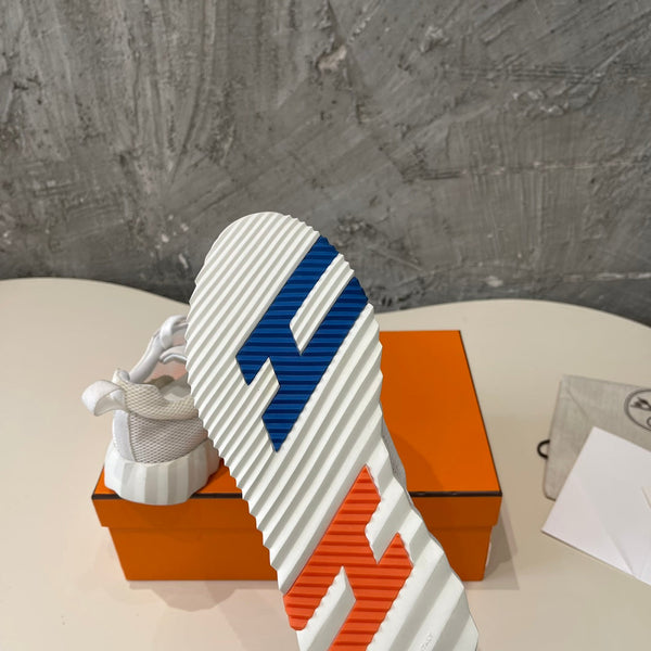 Sneakers HM Bouncing 35 in tela a rete grigia e pelle di capra scamosciata H blu arancione