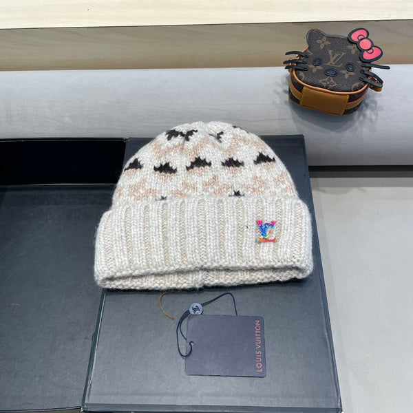 CAPPELLO ANTIVENTO IN LANA COLORATO 406925