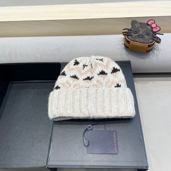 CAPPELLO ANTIVENTO IN LANA COLORATO 406925