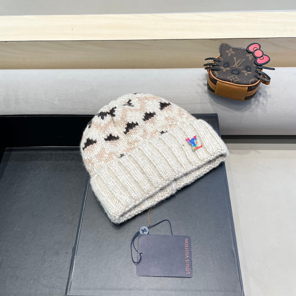 CAPPELLO ANTIVENTO IN LANA COLORATO 406925