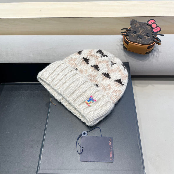 CAPPELLO ANTIVENTO IN LANA COLORATO 406925