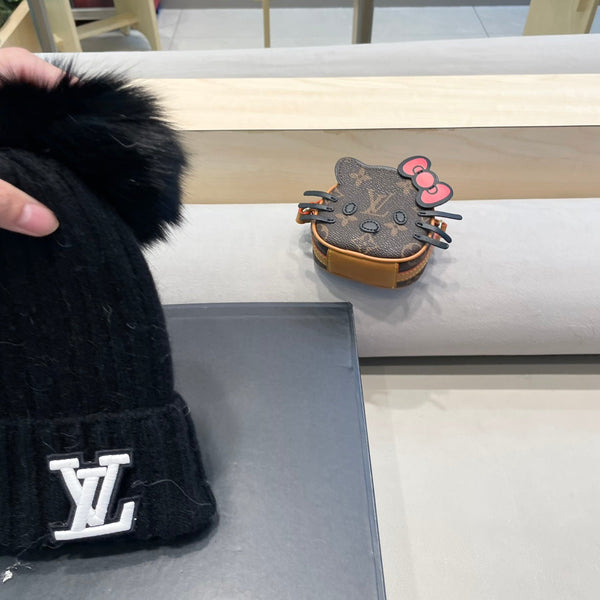 KNITTED BEANIE HAT IN BLACK WOOL 413369