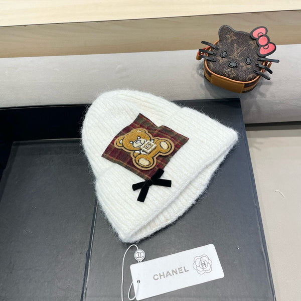 BERRETTO IN LANA BIANCA CON FIOCCO 421253