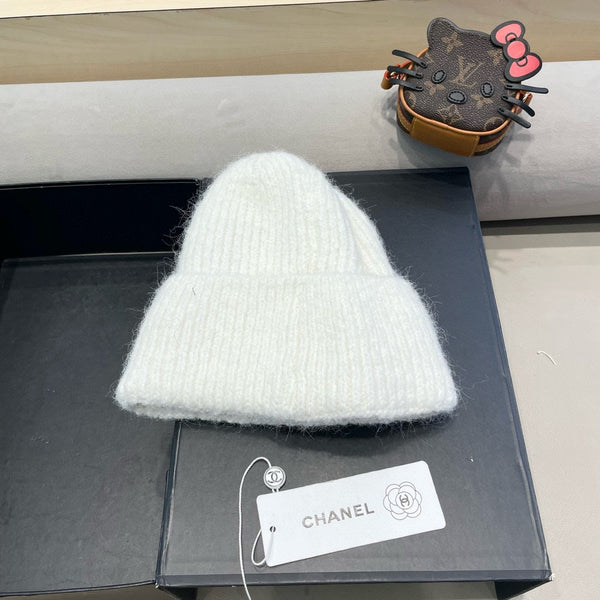 BERRETTO IN LANA BIANCA CON FIOCCO 421253