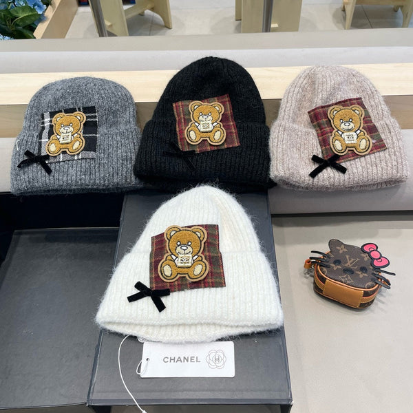 BERRETTO IN LANA BIANCA CON FIOCCO 421253