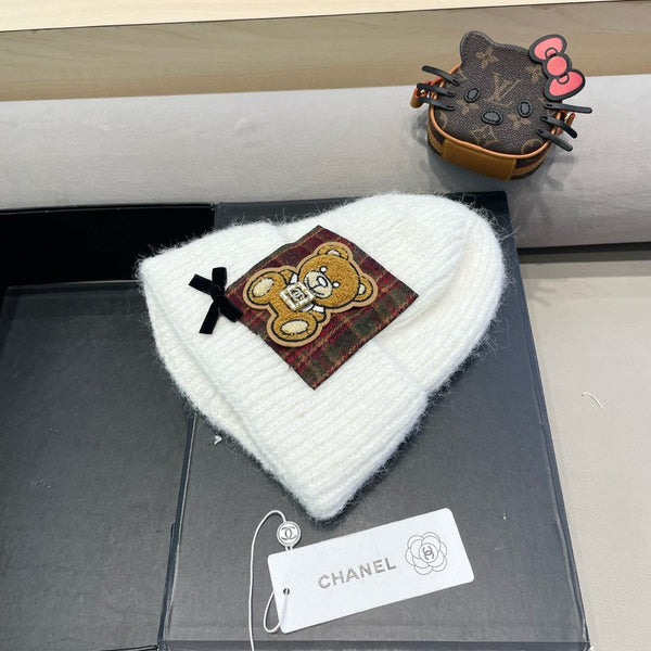 BERRETTO IN LANA BIANCA CON FIOCCO 421253