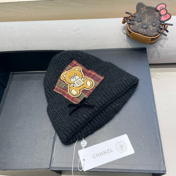 BERRETTO IN LANA NERA CON FIOCCO 421254