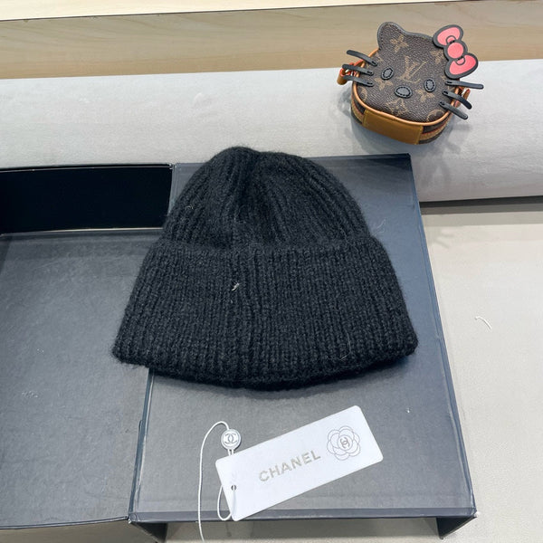 BERRETTO IN LANA NERA CON FIOCCO 421254