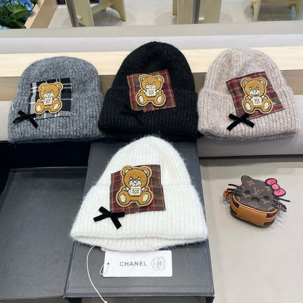 BERRETTO IN LANA NERA CON FIOCCO 421254