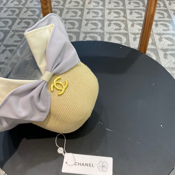 BOW BUCKET HAT IN PALE PURPLE MIX BEIGE RAFFIA 426169