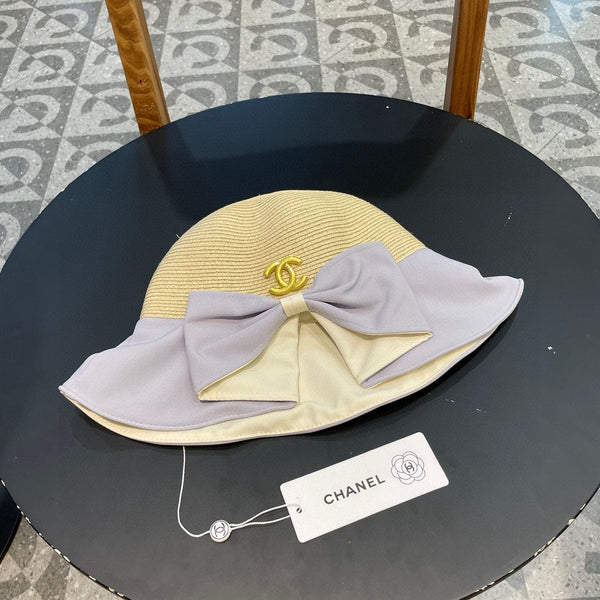 BOW BUCKET HAT IN PALE PURPLE MIX BEIGE RAFFIA 426169