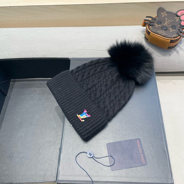 KNITTED BEANIE HAT IN BLACK WOOL 426217