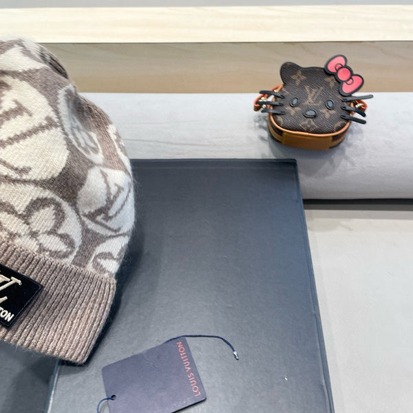 BERRETTO IN MAGLIA DI LANA BEIGE MISTA MARRONE E PELLICCIA DI CONIGLIO 426244