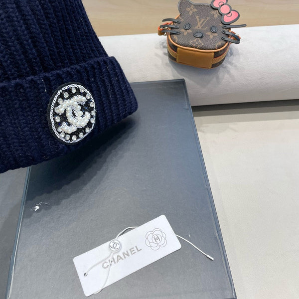 BERRETTO IN MAGLIA DI LANA BLU NAVY 430241