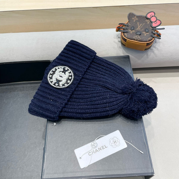 BERRETTO IN MAGLIA DI LANA BLU NAVY 430241