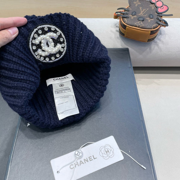 BERRETTO IN MAGLIA DI LANA BLU NAVY 430241