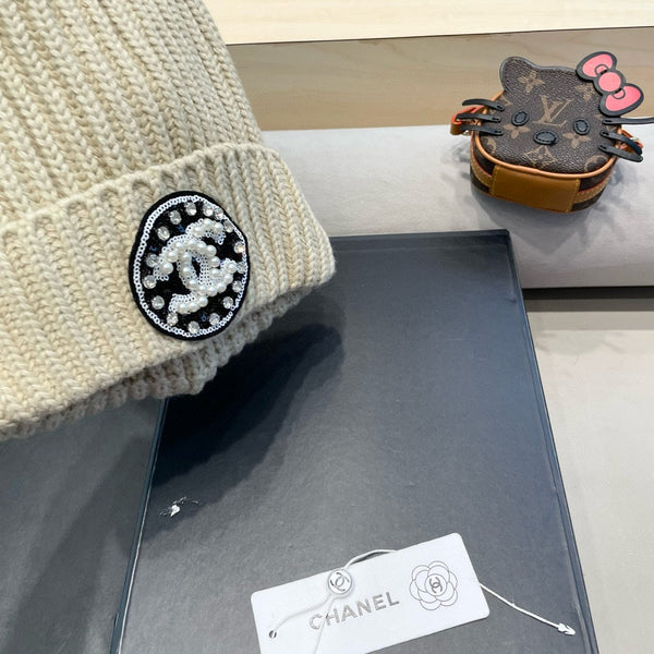 BERRETTO IN MAGLIA DI LANA BEIGE 430242