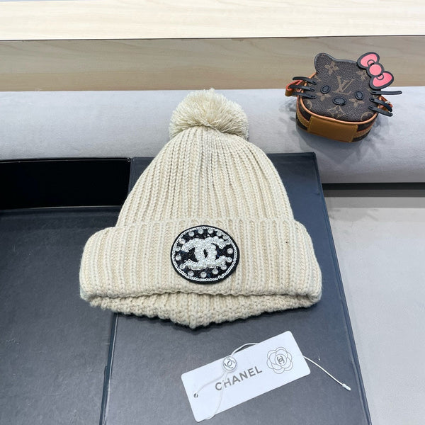 BERRETTO IN MAGLIA DI LANA BEIGE 430242