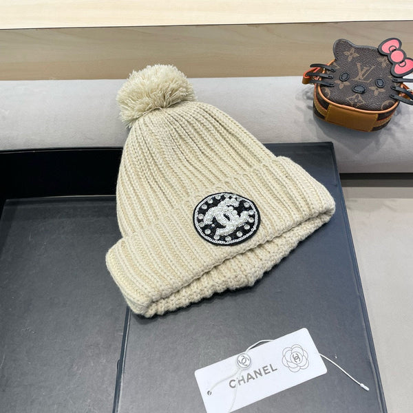 BERRETTO IN MAGLIA DI LANA BEIGE 430242