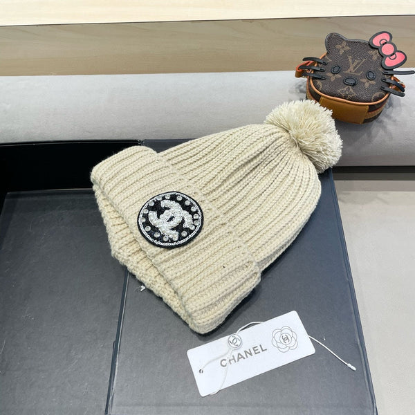 BERRETTO IN MAGLIA DI LANA BEIGE 430242