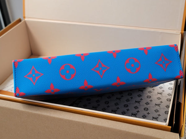 LV M14692 Pochette Voyage Blue Red Monogram Glow Canvas & Cowhide