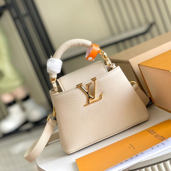 CAPUCINES MINI 21 BEIGE TAURILLON GOLD HARDWARE