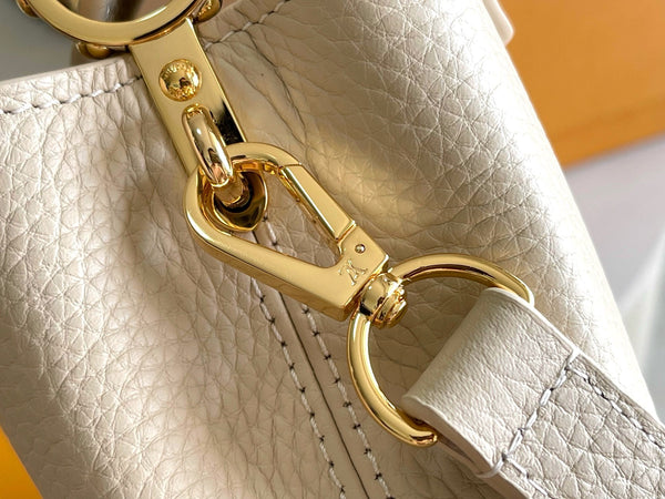 CAPUCINES BB 27 BEIGE TAURILLON GOLD HARDWARE