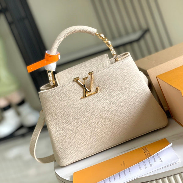 CAPUCINES BB 27 BEIGE TAURILLON GOLD HARDWARE