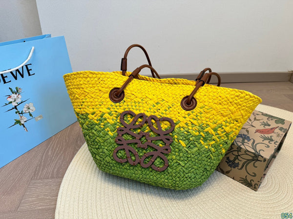 LOE SMALL ANAGRAM BASKET 28 BAG IN YELLOW MIX GREEN IRACA PALM AND CALFSKIN