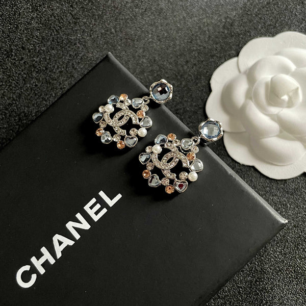 DOUBLE C STUD EARRINGS IN SILVER METAL WHITE PEARL GOLD AND BLUE STONES