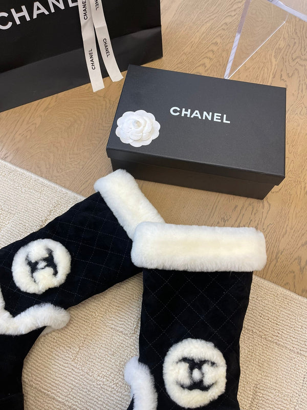 STIVALI ALTI IN CAMOSCIO NERO E FODERA IN PILE