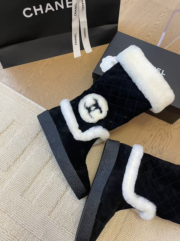 STIVALI ALTI IN CAMOSCIO NERO E FODERA IN PILE