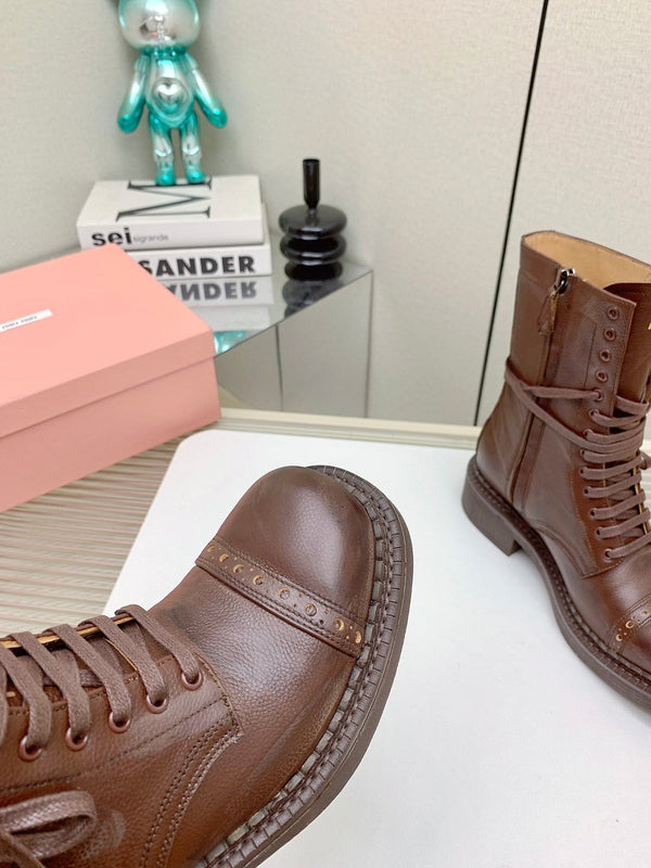 Stivaletti Miu in pelle con lacci in vacchetta marrone castagna