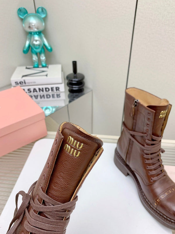 Stivaletti Miu in pelle con lacci in vacchetta marrone castagna